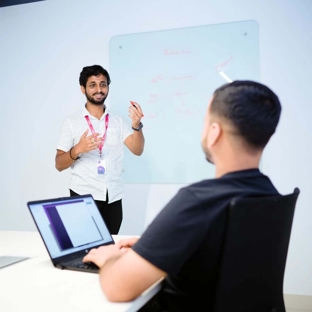 Employees discussing with each other
